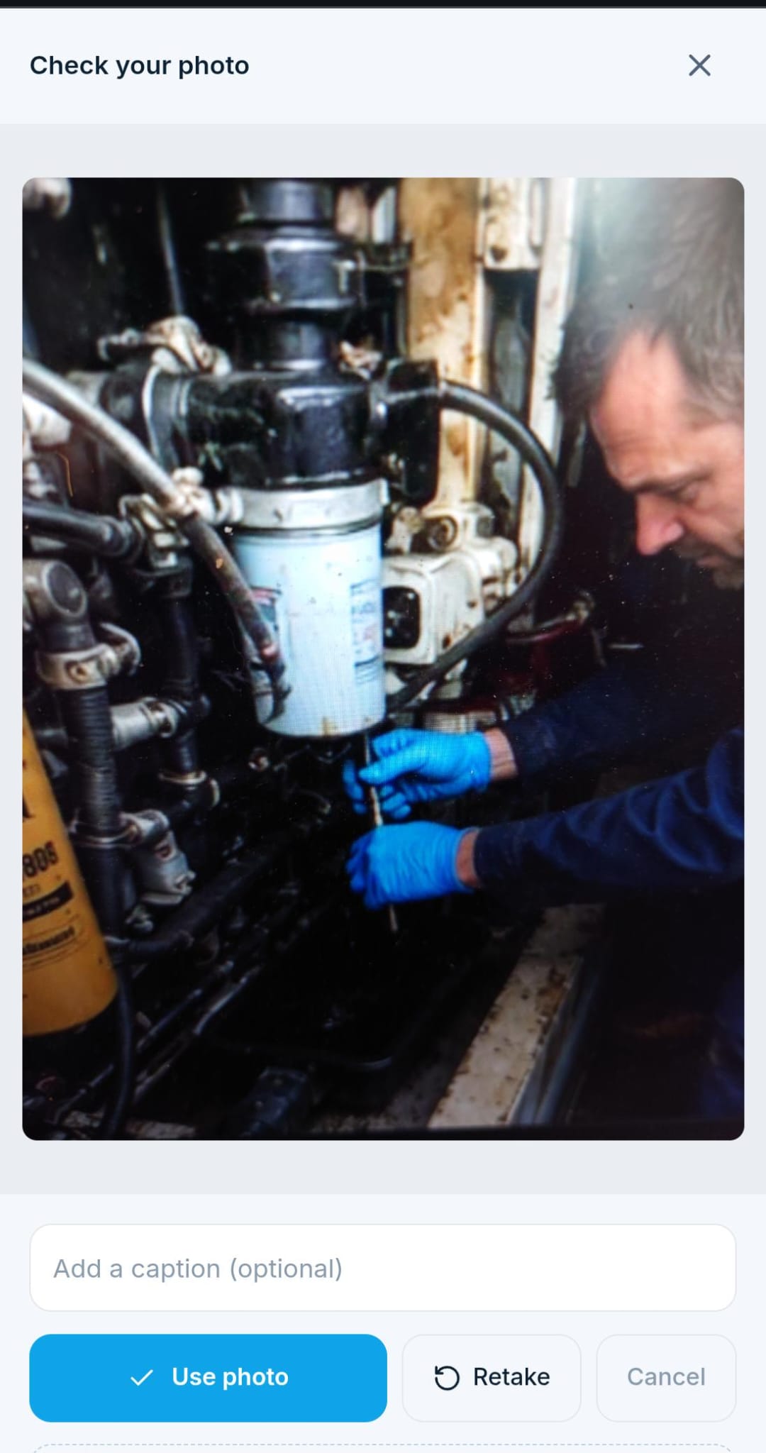 Reviewing a captured evidence photo of a repair in SMS Workboat